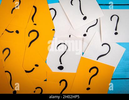 Sticky notes with question marks. Knowledge and research. Stock Photo