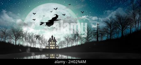 Halloween Silhouette of Witch flying over the full moon, haunted house, bats, and dead tree. Stock Photo