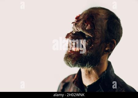 Zombie male makeup for halloween concept on white background Stock Photo
