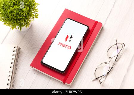 West Bangal, India - October 09, 2021 : Hero logo on phone screen stock image. Stock Photo