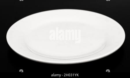 Plate on a black background Stock Photo
