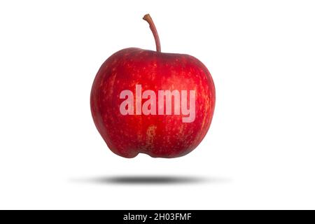 Delicious fresh red whole apple with stalk floating and isolated on a white background. Healthy diet and food symbol Stock Photo