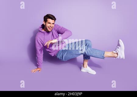 Full length body size photo man smiling dancing breakdance isolated pastel violet color background Stock Photo
