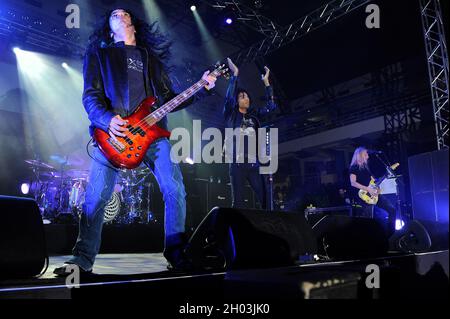 Milan Italy 2009-12-02 : Live concert of Alice in Chains at the Palalido, the bassist Mike Inez,the singer William DuVall and the guitarist Jerry Cantrell Stock Photo