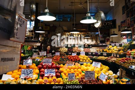 Seattle, Washington, United States of America - Variety of fruits displayed for sale at the produce store in Pike Place Market. Stock Photo