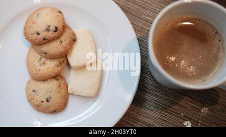 High Class Restaurant Sugar Fix Confection Deserts Cookies and Coffee Stock Photo