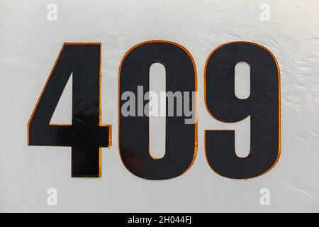 Number 409 on a metal military aircraft fuselage Stock Photo
