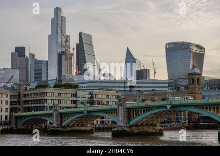 City of London, UK. 11 October 2021. Weak morning sunlight strikes City of London skyscrapers. Credit: Malcolm Park/Alamy Live News Stock Photo