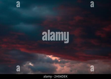 Purple and blue clouds at twilght or dusk. Dramatic clouds background Stock Photo