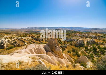 Three graces or Uc Guzeller in Turkish in Cappadocia Urgup Turkey. Beautiful fairy chimneys in Cappadocia. Landmarks of Turkey. Tourism day. Stock Photo