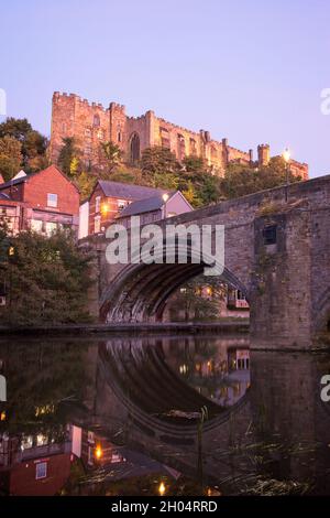 Durham Castle captured from the riverside footpath along the River Wear looking towards Framwellgate Bridge. Stock Photo