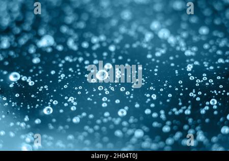 Background of air bubbles on the water surface. Close-up shot of air bubbles in liquid. Selective focus. Extreme close-up images of water bubbles Stock Photo