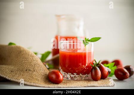 homemade freshly squeezed tomato juice with pulp in a glass decanter Stock Photo