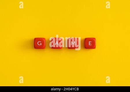 The word "Game" on a red cubes Stock Photo