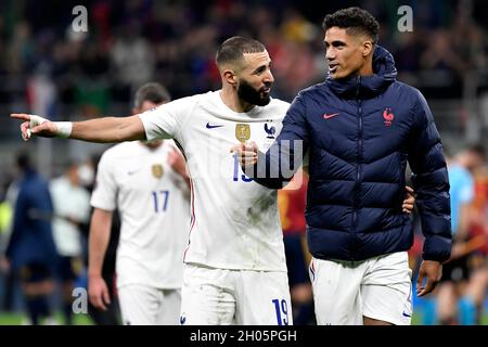 Milano, Italy. 10th Oct, 2021. Karim Benzema and Raphael Varane of France during the Uefa Nations League final match between Spain and France at San Siro stadium in Milano (Italy), October 10th, 2021. Photo Andrea Staccioli/Insidefoto Credit: insidefoto srl/Alamy Live News Stock Photo