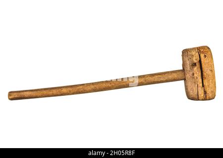 Large old weathered wooden hammer with woodworm isolated on a white background Stock Photo