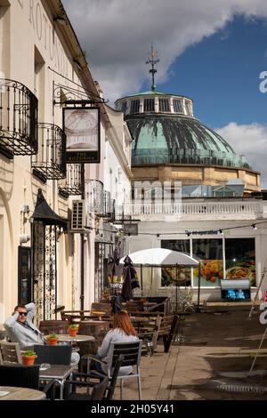 UK, Gloucestershire, Cheltenham, Montpelier, Rotunda Tavern customers on pavement Stock Photo