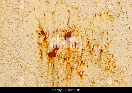 Rust stains on the old painted metal surface. Stock Photo
