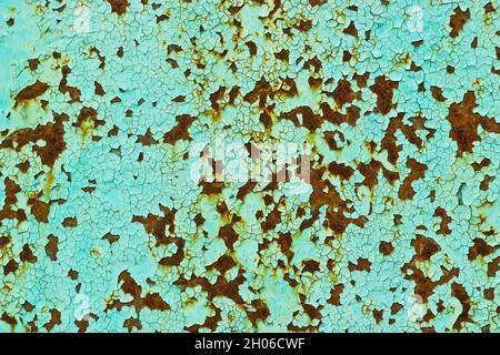 Rust stains on the old painted metal surface. Stock Photo