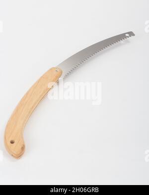 Folding garden saw, gardening tool isolated on white background Stock Photo