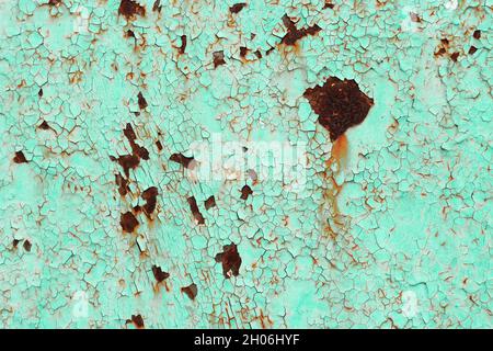 Rust stains on the old painted metal surface. Stock Photo