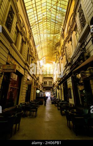 Bucharest, Romania, 22 November 2020 - The old historical Pasajul Macca Vilacrosse passage with coffee shops and restaurants near Calea Victoriei (Vic Stock Photo