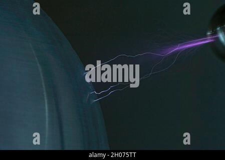 electric discharge lightning on ribbon generator Stock Photo