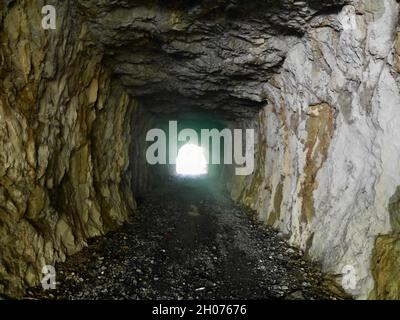 Looking through a tunnel in the Swiss mountains. Alpe Rohr, St.Gallen, Switzerland.