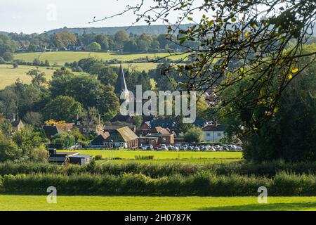 View over Shere village in the Surrey Hills Area of Outstanding Natural Beauty, England, UK, on a sunny October or autumn day Stock Photo