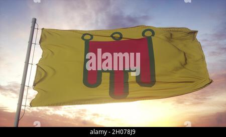 Auvergne flag, France, waving in the wind, sky and sun background. 3d rendering Stock Photo