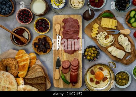 Flat-lay of Organic, and fresh delicious traditional Turkish breakfast on table. Stock Photo