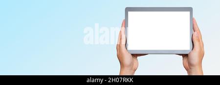 Hand holding digital tablet, placeholder for app, blank screen mockup Stock Photo