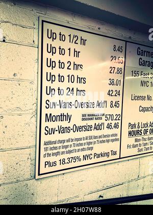 Parking Garage Rates Sign in NYC, 2021, USA Stock Photo