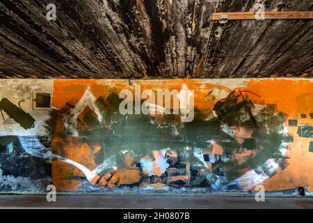 Wall Covered in Multicolor Paint Great for Gunge Backdrop or background Stock Photo
