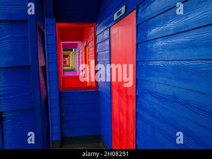 Colourful beach huts on the promenade at Saltburn by the Sea. Stock Photo