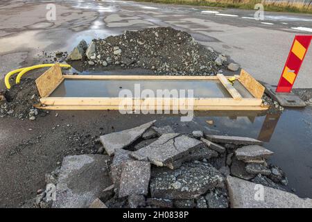 Close up view of part of road under reconstruction. Road renovation work. Sweden. Stock Photo