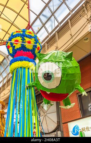 tokyo, japan - august 5 2019: Mashed paper sculptures of the American anime Monsters, Inc. character Michael Wazowski in the Asagaya Pearl Center shop Stock Photo