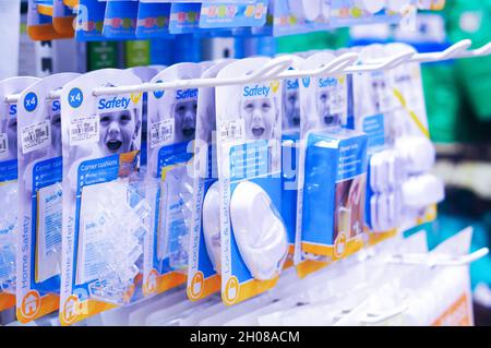 POZNAN, POLAND - Jan 31, 2016: A selective of hanging baby safety tools for sale in a store Stock Photo