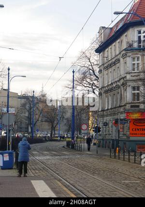 POZNAN, POLAND - Jan 31, 2016: A gloomy day and tram rails in the center of the city on a cloudy day Stock Photo