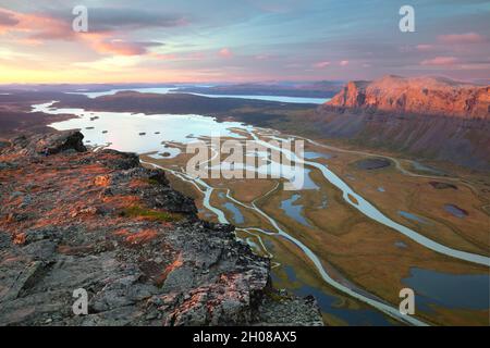 View from the top of Skierfe in Sarek right after sunrise in the morning, in fall Stock Photo