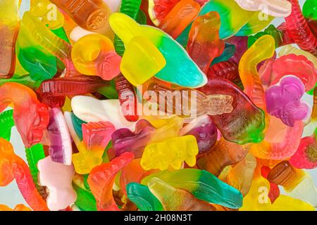 Assorted tasty gummy candies. Top view. Fruit gummy candies background Stock Photo