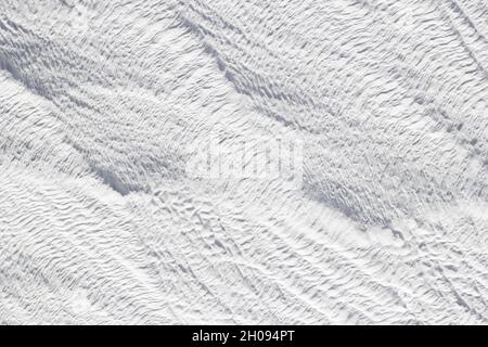 Gray - white texture of Pamukkale calcium travertine in Turkey, abstract pattern of the feathers close-up. Stock Photo