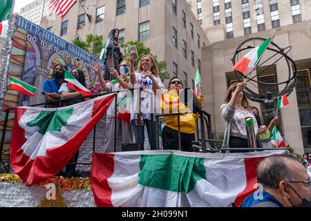 NEW YORK, NY - JULY 07: People participate in the annual Columbus Day Parade up Fifth Avenue in Manhattan on October 11, 2021 in New York City. The annual event celebrates the day that Christopher Columbus landed in the Americas in 1492. Stock Photo