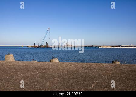 Swinoujscie, Poland - Transshipment port for coal, apatite, phosphate and iron ore. Industrial area seen from above, lng terminal. Gazoport. Stock Photo