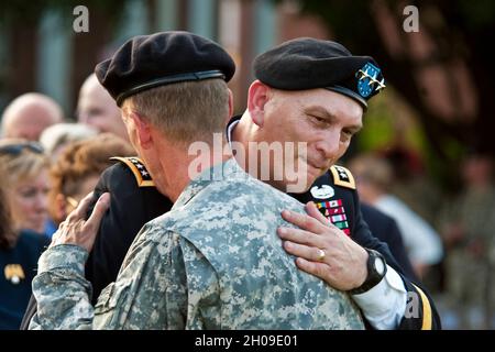 United States General Ray Odierno, Commanding General United States Forces - Iraq, embraces U.S. Army General Stanley A. McChrystal at the conclusion of McChrystal's retirment ceremony at Ft. McNair in Washington DC, Friday, July 23, 2010.  McChrystal  retired from the U.S. Army after 34 years of service to his nation during both peace and war time.  .Mandatory Credit: D. Myles Cullen - U.S. Army via CNP /MediaPunch Stock Photo