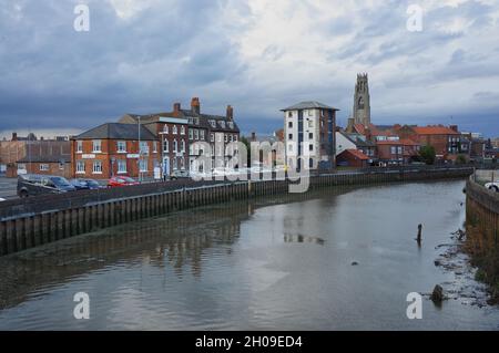 Riverside view of the river Witham & high St. from Haven bridge featuring the Boston stump tower Stock Photo