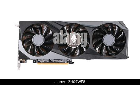 Silver Ethereum coin lies on a black video card. Crypto currency. Bitcoin mining concept Stock Photo