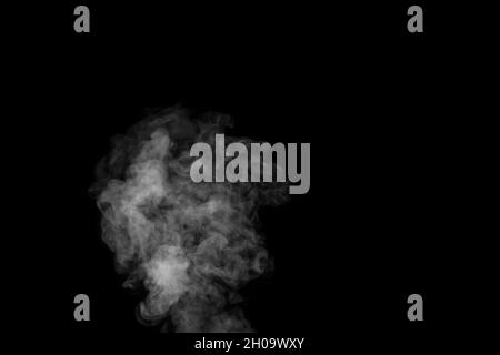 Premium Photo  Close up of steam smoke on black background. white hot  curly steam smoke isolated on black background, close-up. create mystical  halloween photos. abstract background, design element