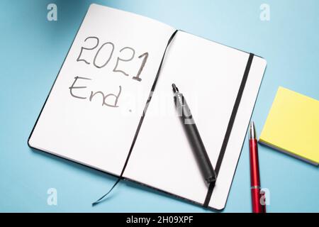 Concet showing End of 2021 written on dairy Stock Photo