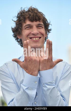 74th edition of the Cannes Film Festival: director Cedric Jimenez posing during a photocall for his film “BAC Nord”, on July 13, 2021 Stock Photo